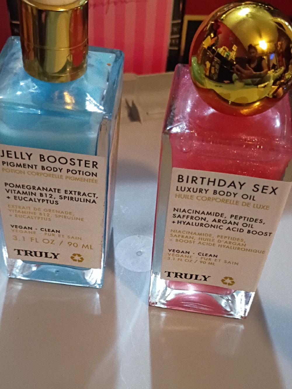 TRULY Jelly Booster & Birthday Sex Body Oils — Blue and Pink Bottles